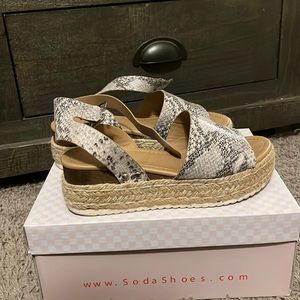 Snakeskin wedges! Slight hill, goes around ankle!